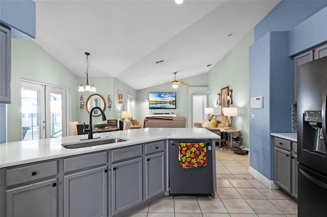 kitchen with sink, hanging light fixtures, stainless steel fridge, gray cabinets, and dishwasher