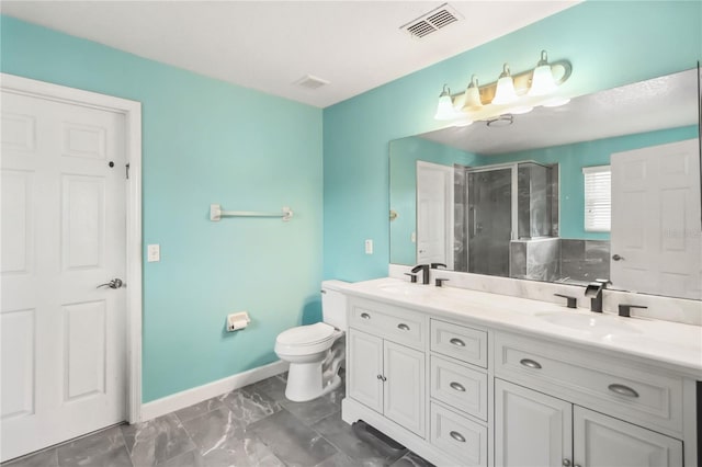 bathroom featuring vanity, toilet, and walk in shower