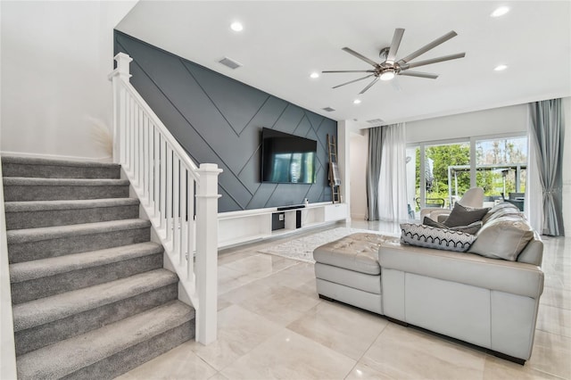 living room featuring ceiling fan