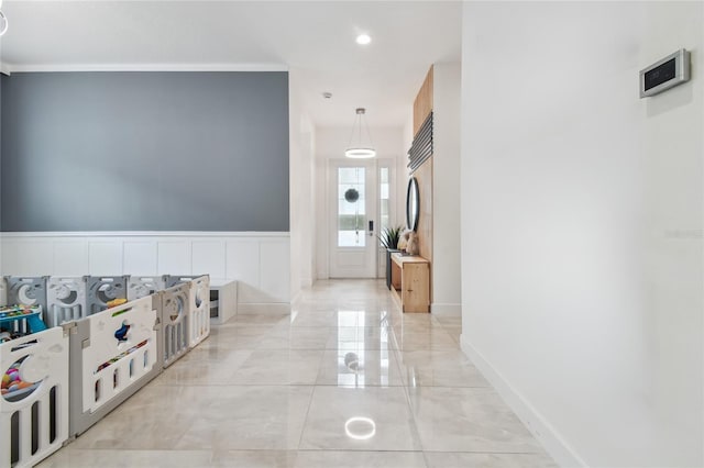 interior space featuring crown molding