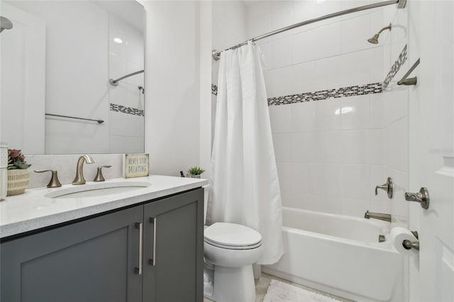 full bathroom with vanity, shower / bathtub combination with curtain, and toilet