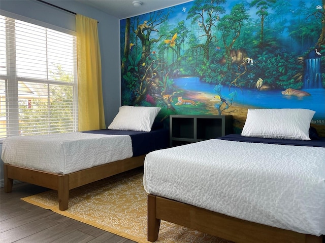 bedroom featuring wood-type flooring