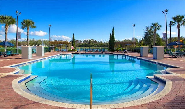 view of pool featuring a patio