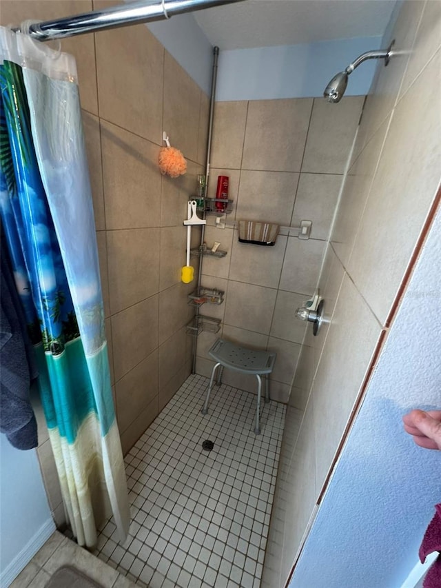 bathroom featuring curtained shower