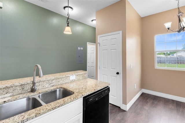 kitchen featuring sink, white cabinetry, decorative light fixtures, dishwasher, and light stone countertops