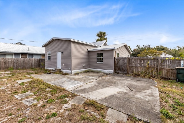 back of house featuring a patio