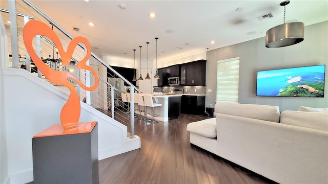 living room featuring dark hardwood / wood-style floors