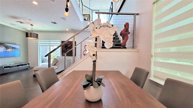 dining area with hardwood / wood-style floors