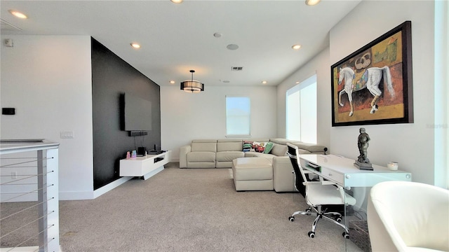 living room featuring light carpet