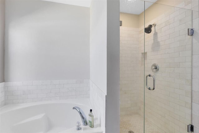 bathroom with independent shower and bath