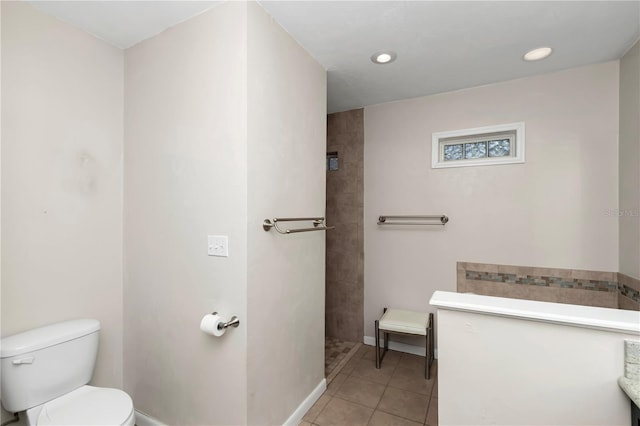 bathroom with tile patterned floors and toilet