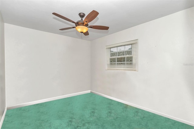 empty room with ceiling fan and carpet