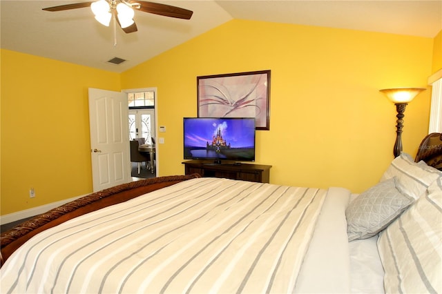 bedroom with lofted ceiling and ceiling fan