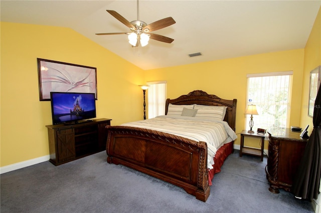 bedroom featuring carpet floors, vaulted ceiling, and ceiling fan