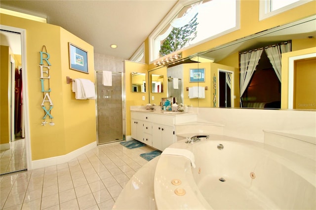 bathroom with vanity, plus walk in shower, and tile patterned flooring