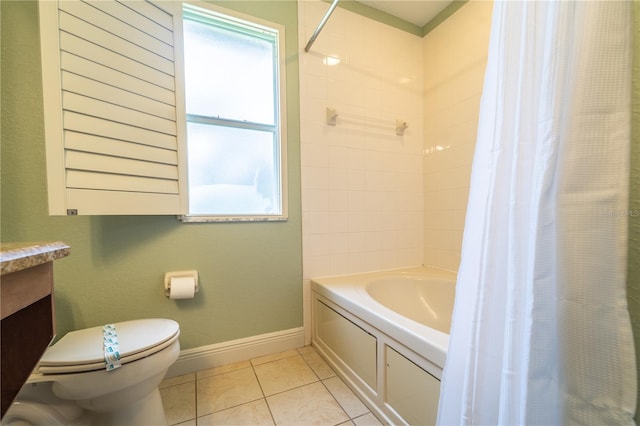 full bathroom with shower / bath combination with curtain, vanity, tile patterned floors, and toilet