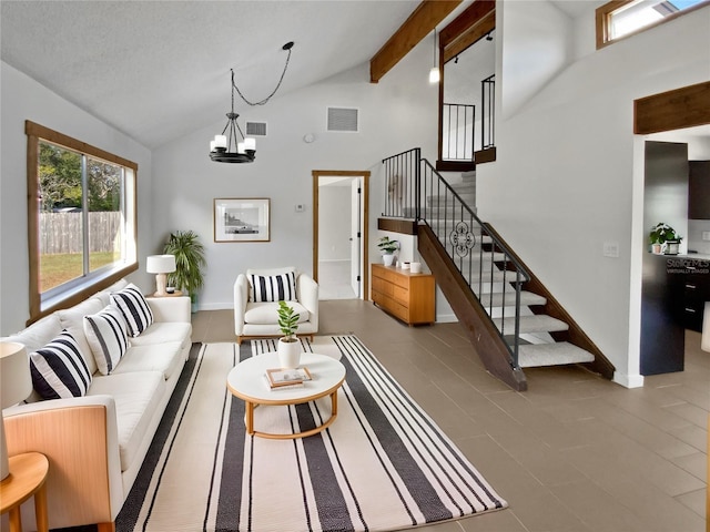 living room featuring an inviting chandelier, a textured ceiling, high vaulted ceiling, and beamed ceiling