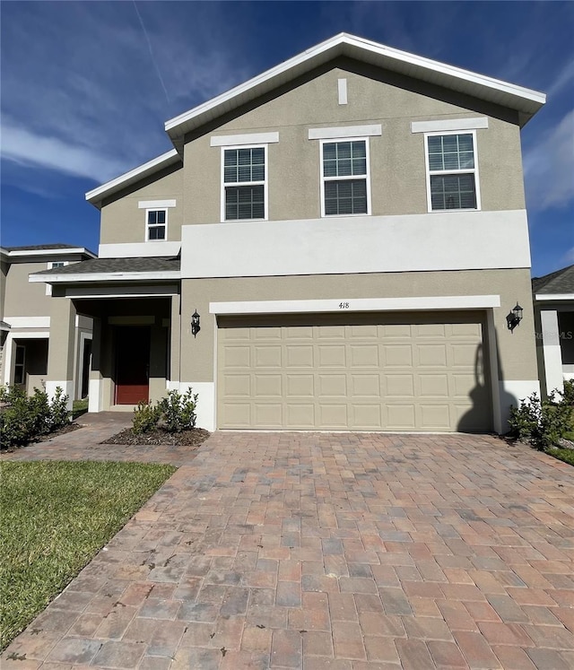 view of front of home featuring a garage