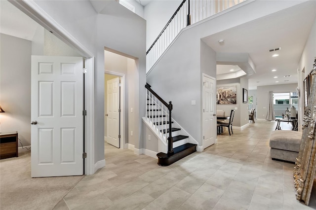 foyer with a high ceiling