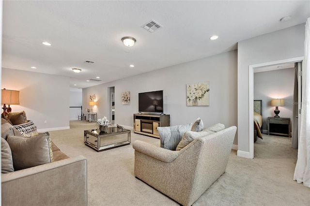 living room featuring light carpet