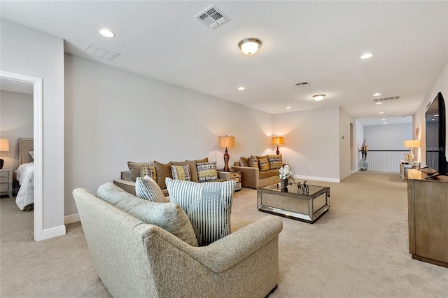 living room featuring light carpet