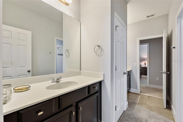 bathroom with vanity and walk in shower