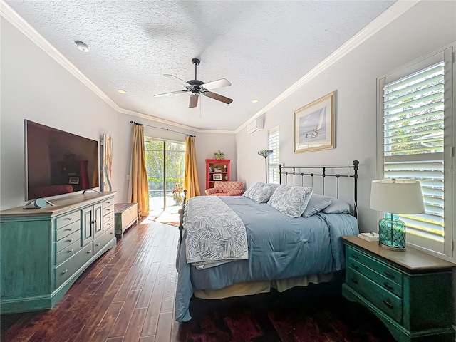 bedroom with dark hardwood / wood-style floors, a wall unit AC, ornamental molding, access to exterior, and a textured ceiling