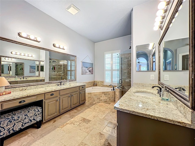 bathroom with vanity and plus walk in shower