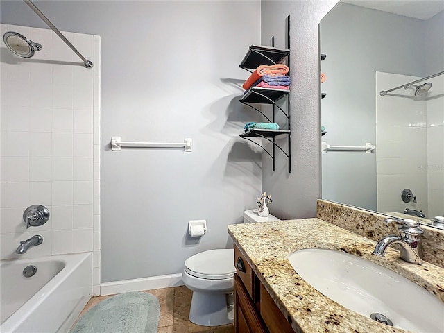 full bathroom with tiled shower / bath combo, vanity, and toilet