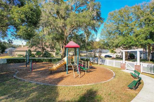 view of play area featuring a lawn