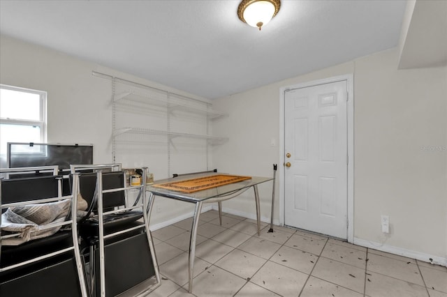 interior space featuring light tile patterned floors