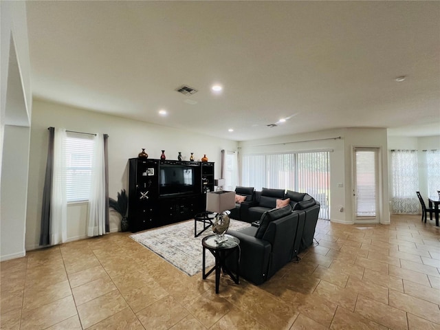 living room featuring a healthy amount of sunlight