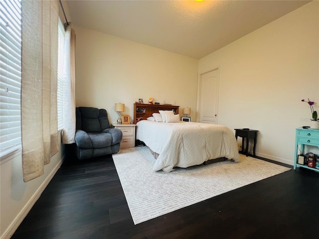 bedroom featuring hardwood / wood-style floors