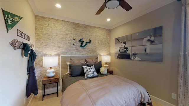 bedroom featuring ceiling fan and ornamental molding