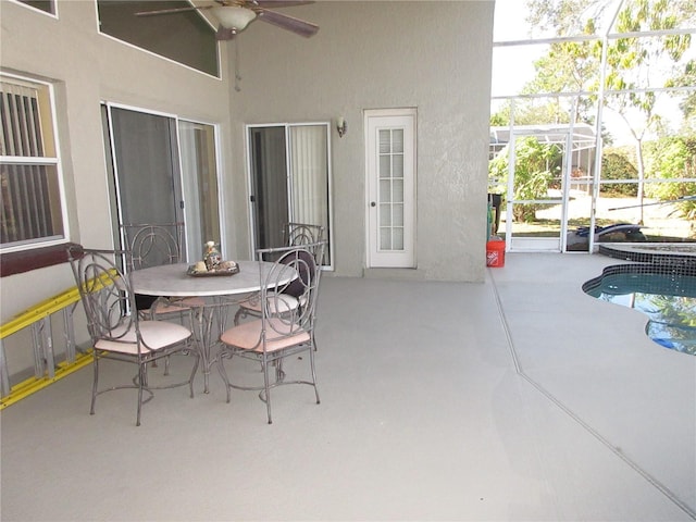 view of patio / terrace featuring a lanai