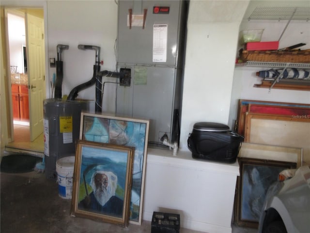 utility room featuring electric water heater