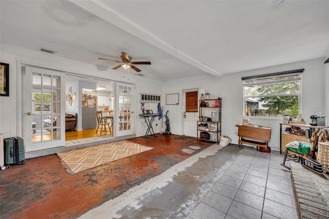 interior space featuring ceiling fan