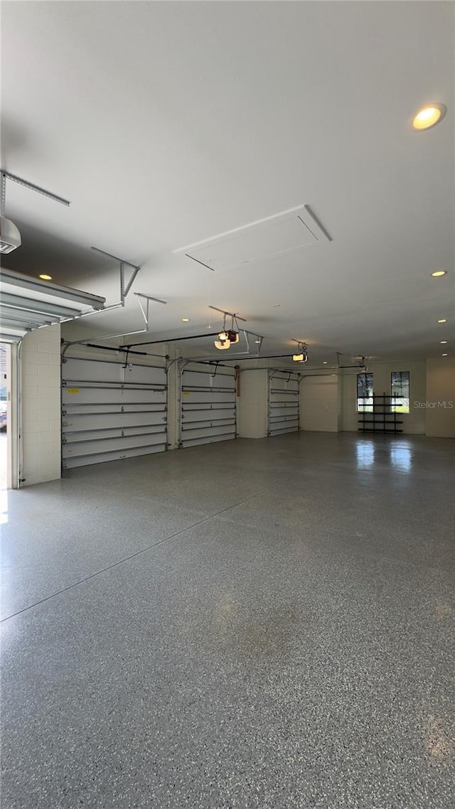 garage featuring a garage door opener