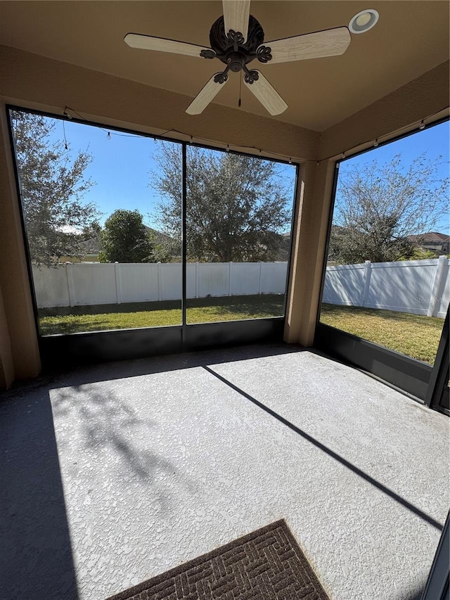 unfurnished sunroom with plenty of natural light