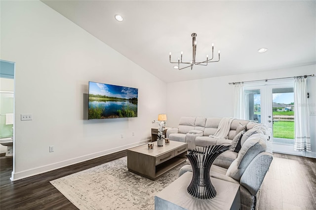 living room featuring a notable chandelier, dark wood-type flooring, and high vaulted ceiling