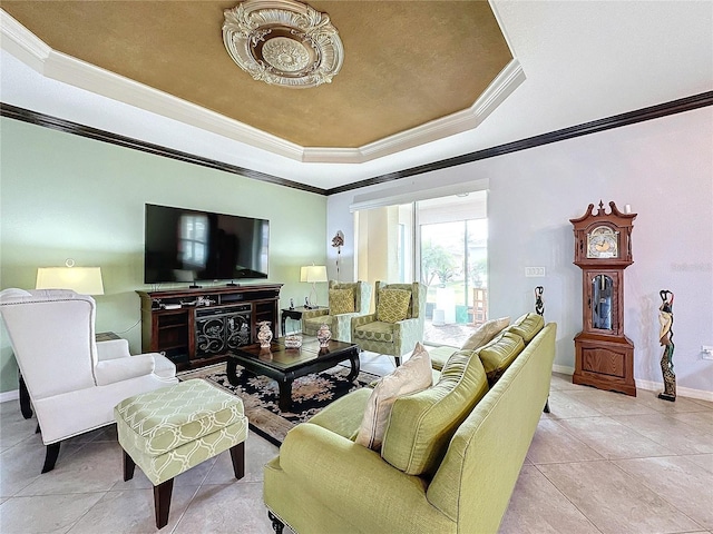 tiled living room featuring a raised ceiling and crown molding