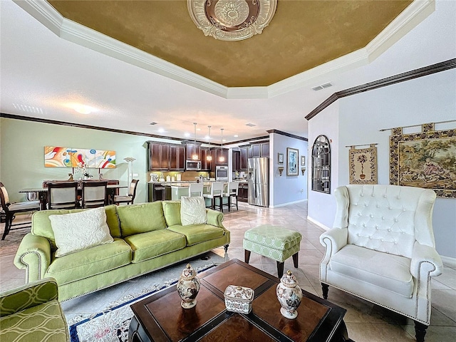 tiled living room with crown molding and a tray ceiling