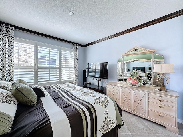 bedroom featuring ornamental molding and a textured ceiling