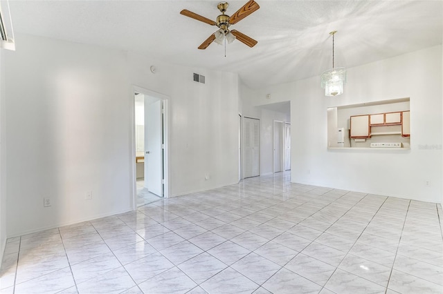 spare room featuring ceiling fan