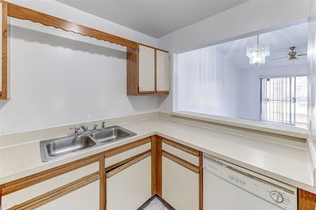 kitchen featuring sink, white cabinets, hanging light fixtures, a notable chandelier, and white dishwasher