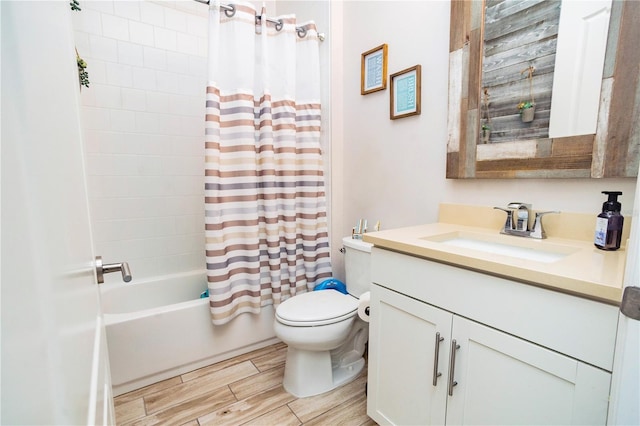 full bathroom featuring vanity, shower / bath combination with curtain, and toilet