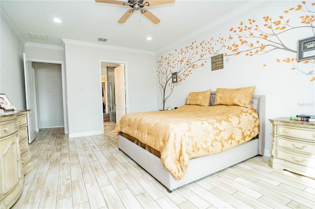 bedroom with connected bathroom, ornamental molding, ceiling fan, and light wood-type flooring