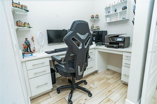 office area featuring built in desk