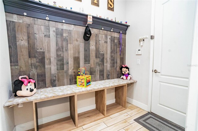 mudroom featuring wood-type flooring