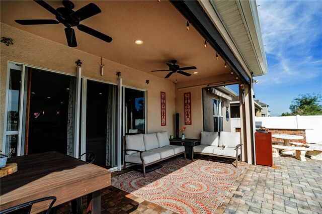 view of patio / terrace with an outdoor hangout area and ceiling fan